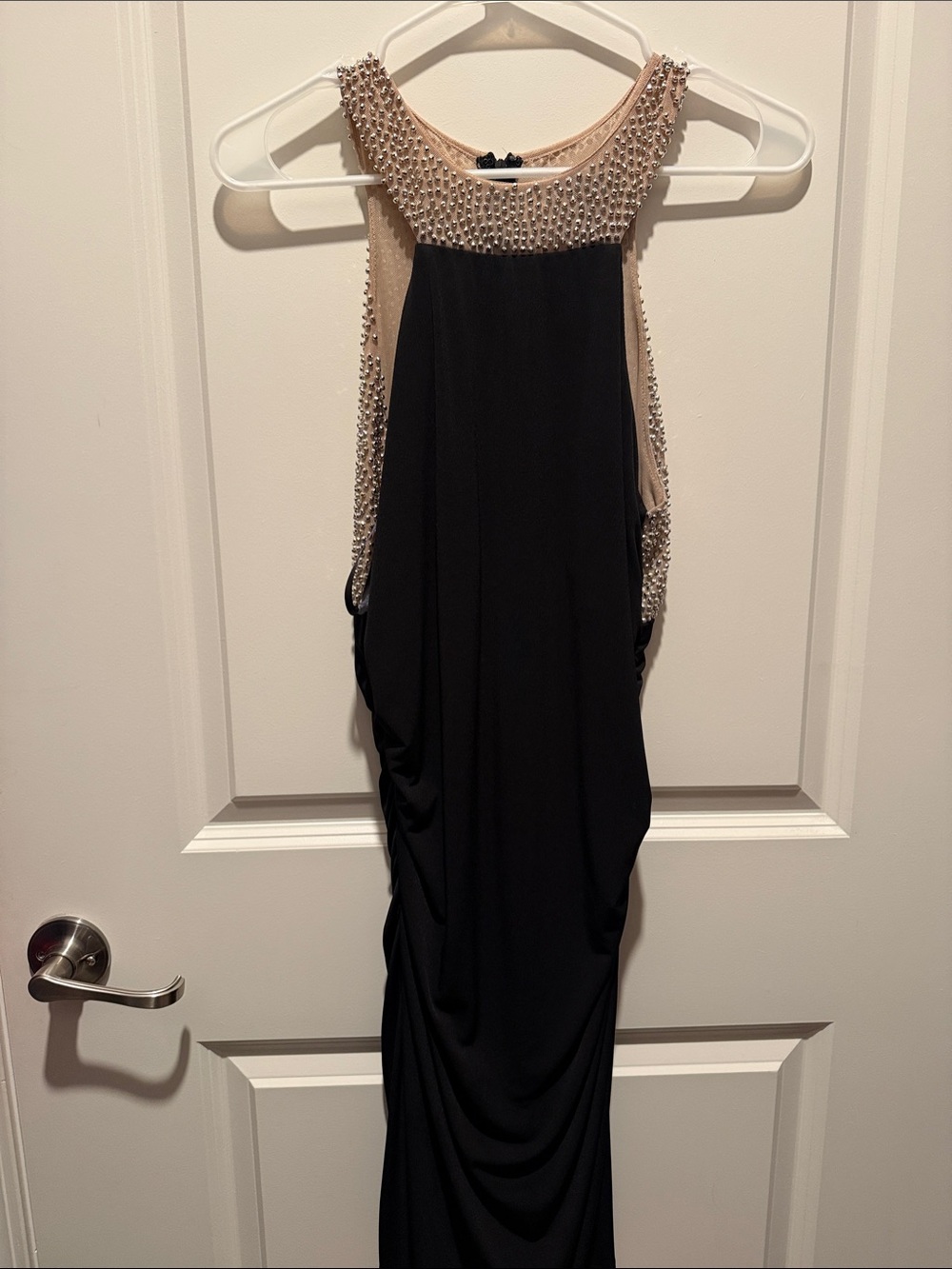 Sleeveless Black Knee Length Evening Dress with Nude Beaded Neckline